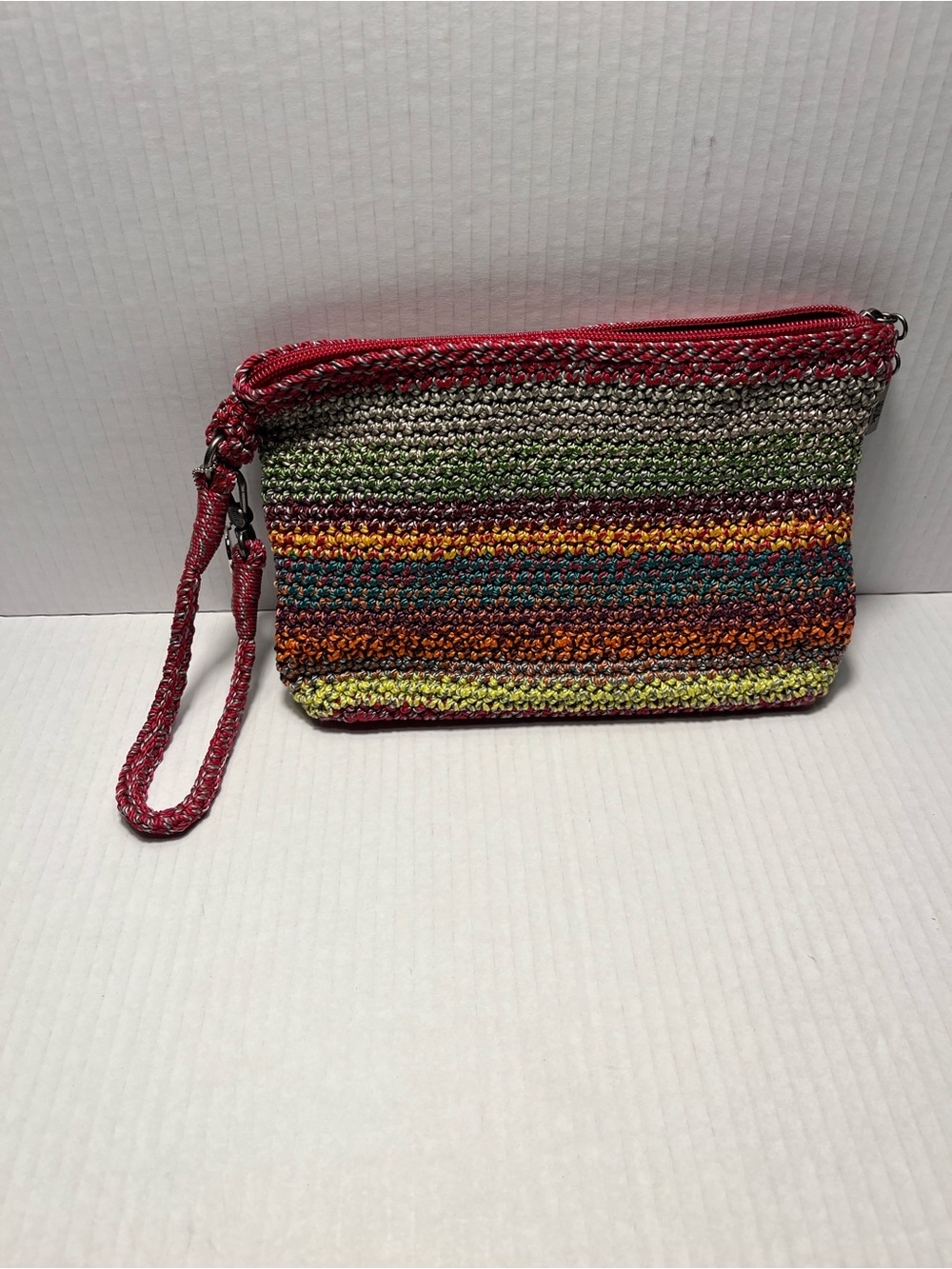 The Sak rainbow stripe crochet wristlet